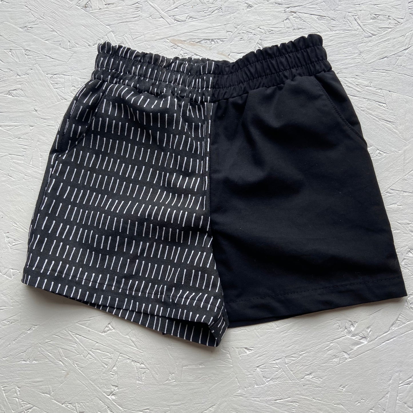 Black Lines Split Indy Shorts